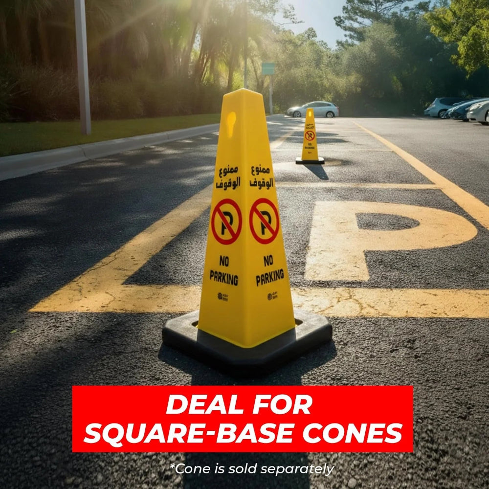 A yellow square-base traffic cone