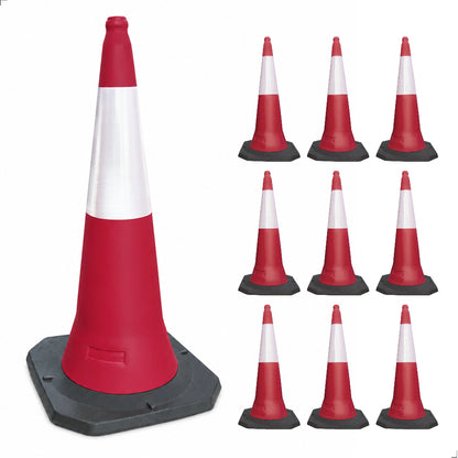 Set of red and white traffic cones with gray bases
