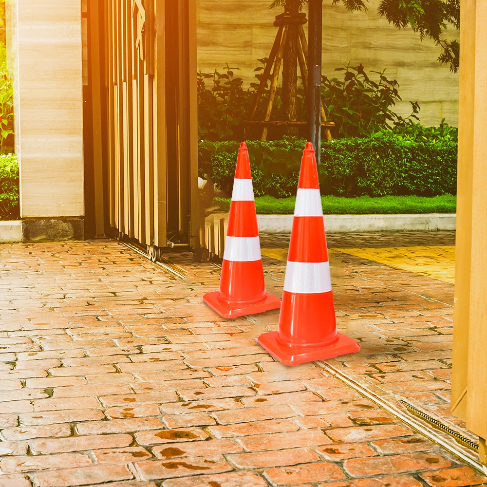 Two orange and white traffic cones 