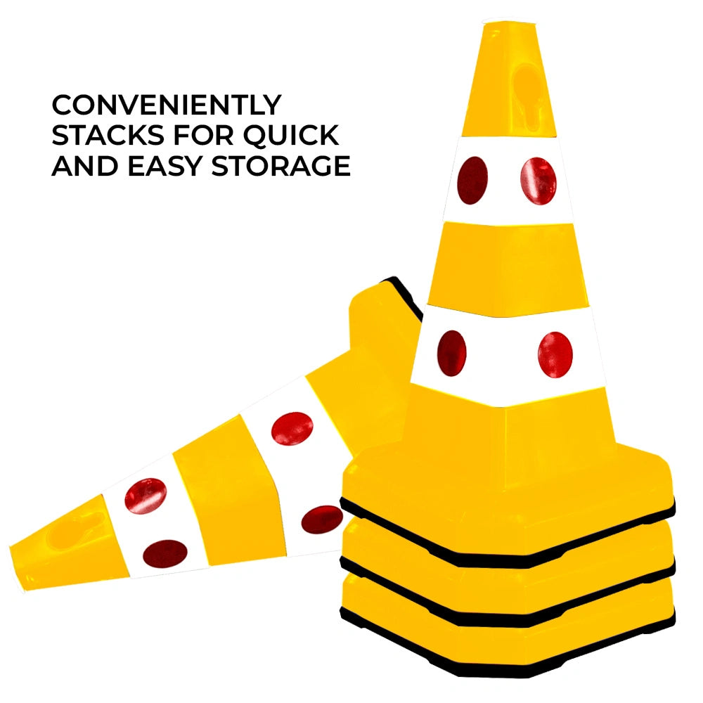 Three yellow and white traffic cones with red 