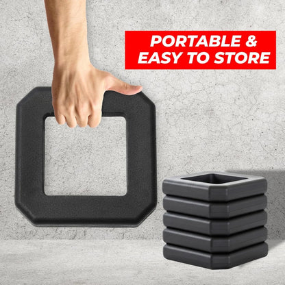 A hand holds a black base 