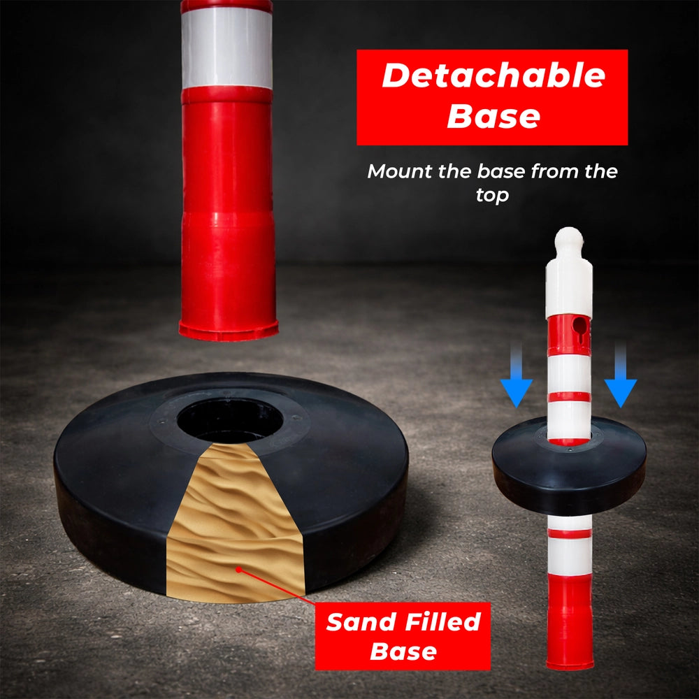 Red and white traffic post with detachable sand-filled base on a dark background