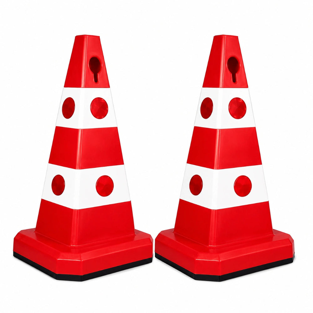 Two red and white striped plastic traffic cones 