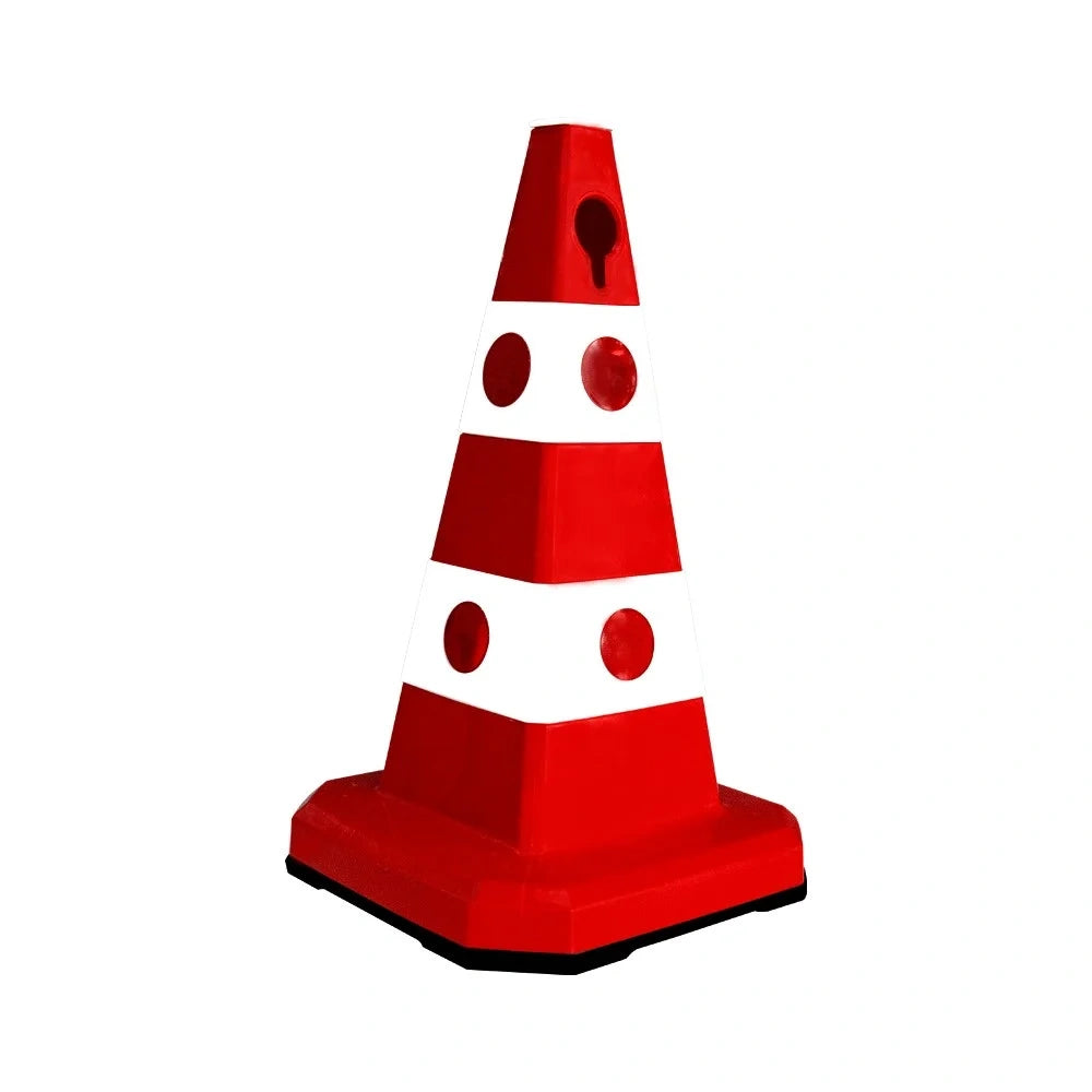 A red and white traffic safety cone with reflective circular markings, 