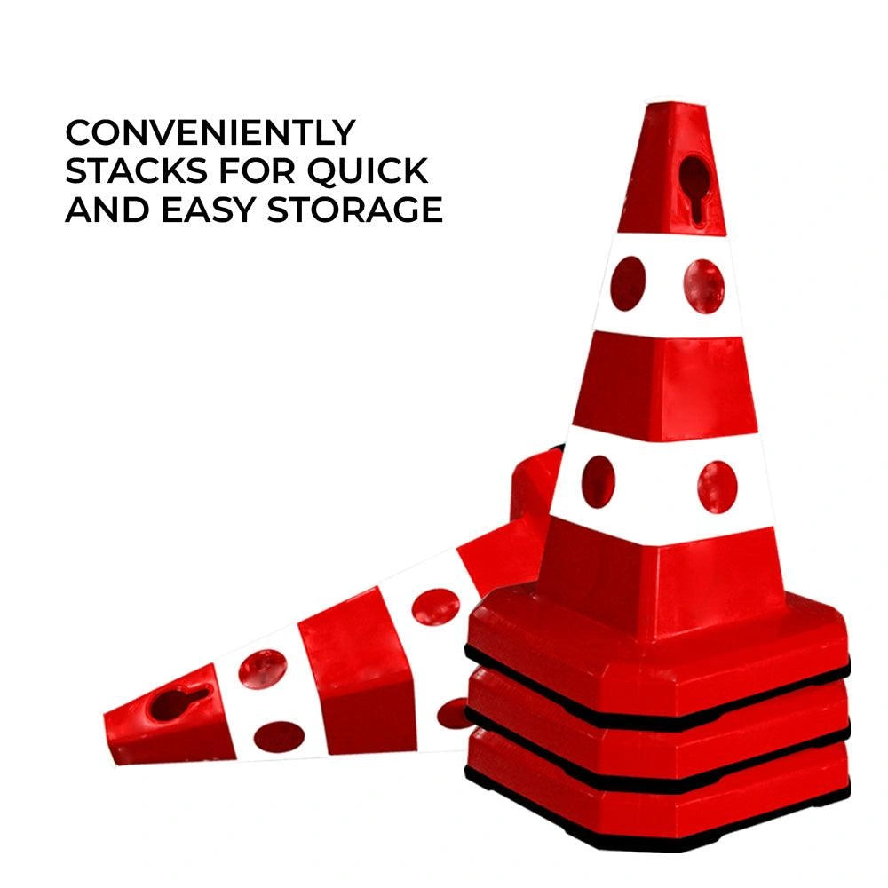 Red and white striped traffic safety cones with circular cutouts