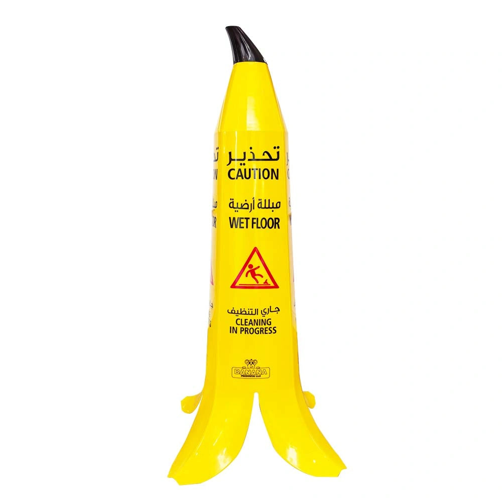 A long, narrow black and yellow striped safety post 